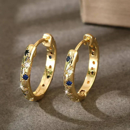 Sparkling hoop earrings with stars and crescent moons for women