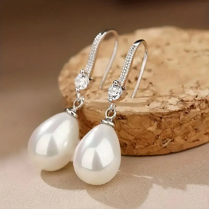 Elegant pearl earrings with sparkling cubic zirconia stones