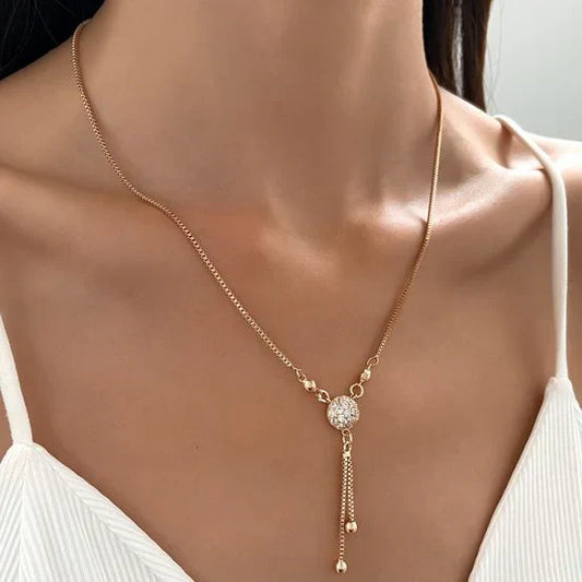 Elegant Y-Necklace with Shimmering Pendant and Beaded Chains