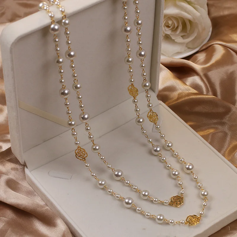 Elegant Double-Row Pearl Necklace with Delicate Rose Details