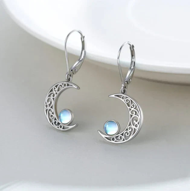 Filigree moon earrings with a sparkling rainbow moonstone and a lever clasp