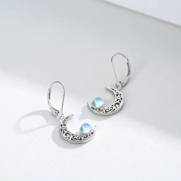 Filigree moon earrings with a sparkling rainbow moonstone and a lever clasp