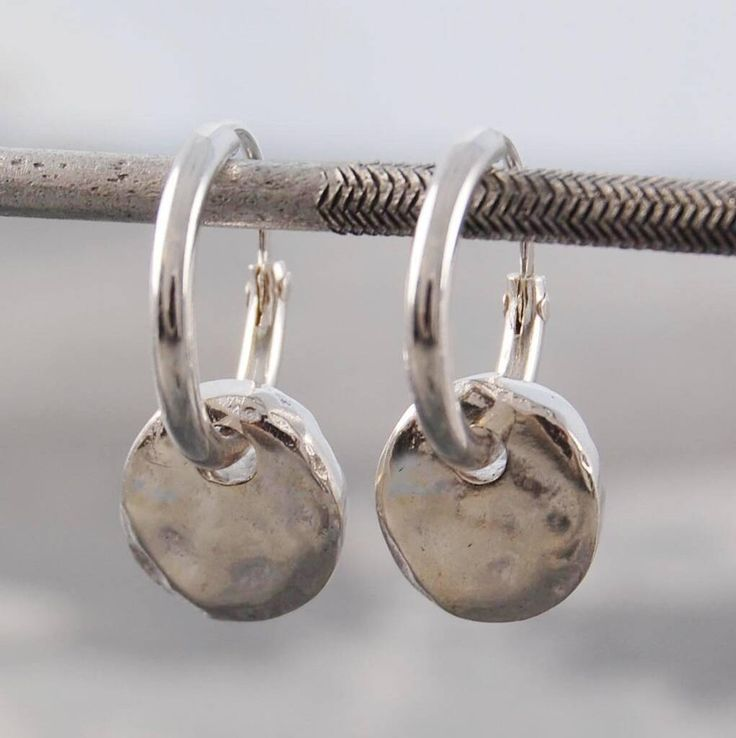 Vintage stud earrings with round pendants