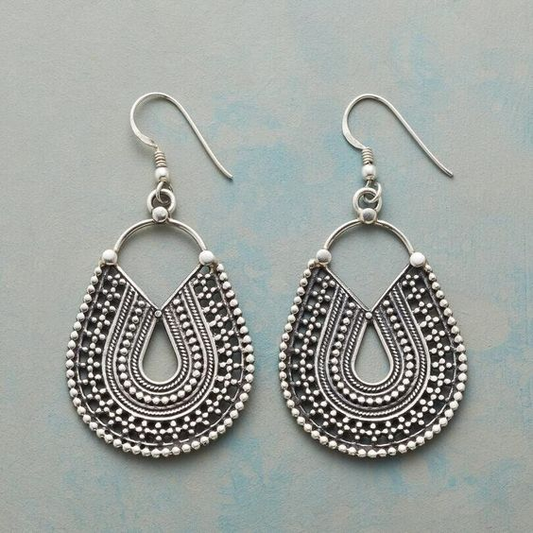 Delicate vintage teardrop-shaped earrings with an ethnic mandala design