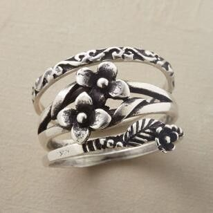 Ring with Knot Pattern and Gem