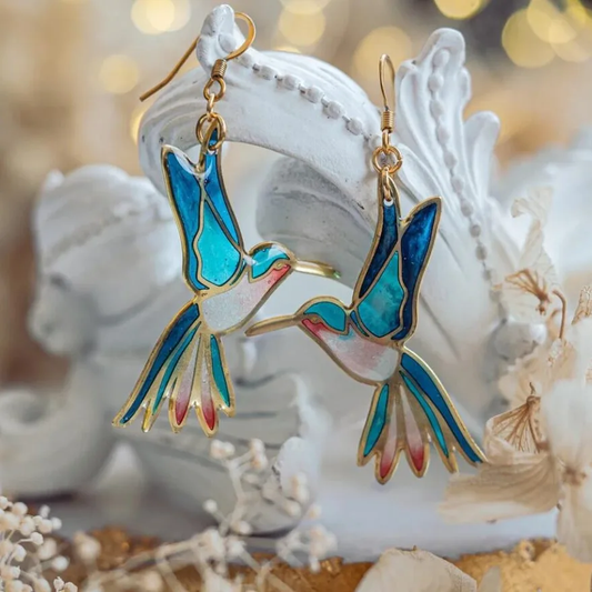 Handmade hummingbird enamel earrings in blue, pink and green