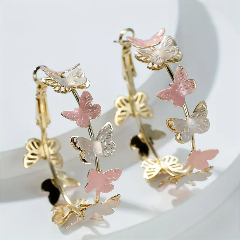 Pastel-coloured butterfly hoop earrings for spring