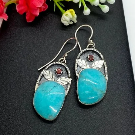 Vintage earrings with turquoise stones, leaves and embellishments