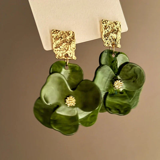 Vintage green floral earrings with textured metal detailing