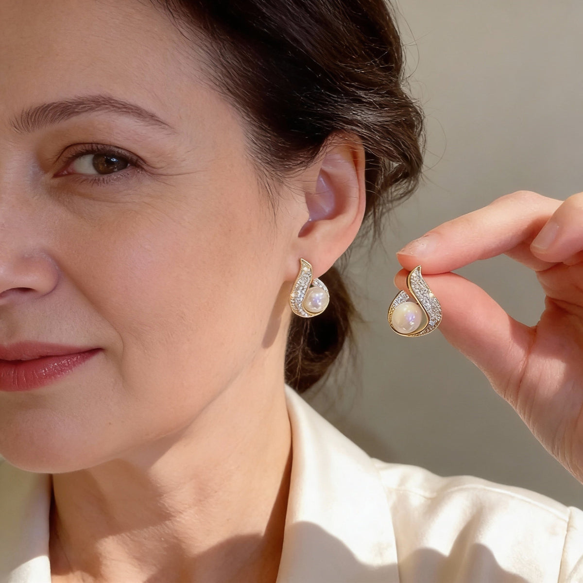 Elegant cubic zirconia earrings with sparkling teardrop-shaped beads