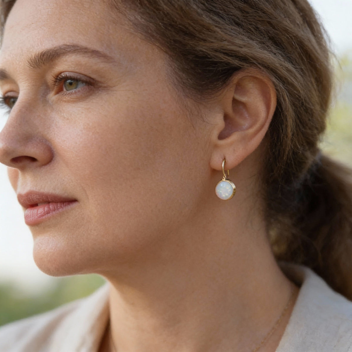Opal Dangle Earrings with Delicate Iridescence and Gold Finish