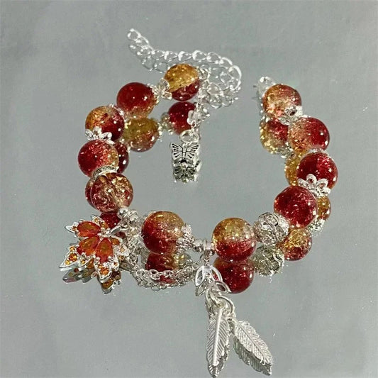 An autumn-inspired bracelet in bright red and gold
