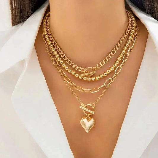 Multi-Layer Statement Necklace with Heart Pendant and Mixed Chains