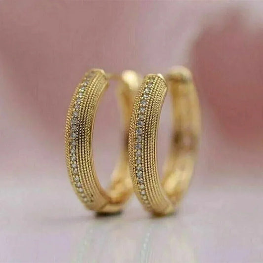 Elegant hoop earrings with sparkling cubic zirconia details in a vintage style