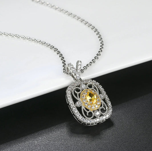 Elegant Pendant with Yellow Gemstone and Sparkling Cubic Zirconia Crystals
