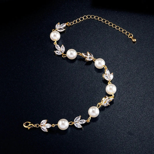 Elegant pearl bracelet with sparkling cubic zirconia leaves for women