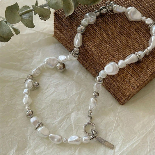 Elegant Freshwater Pearl Necklace with Shimmering Metallic Details