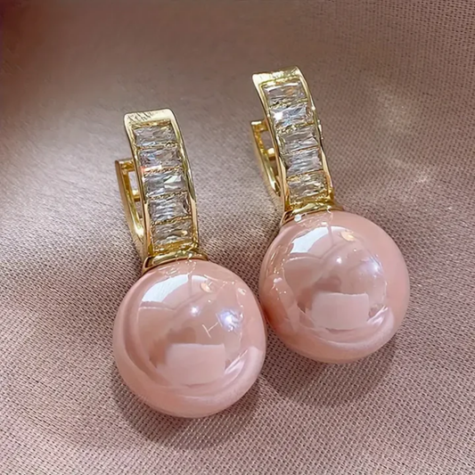 Elegant earrings with pink pearls and sparkling cubic zirconia