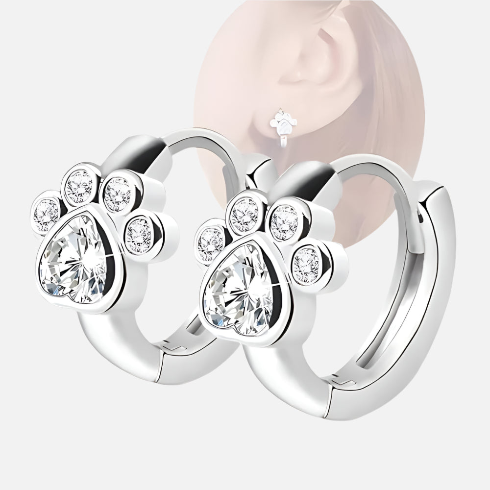 Hoop earrings featuring a paw print and sparkling cubic zirconia, for animal lovers