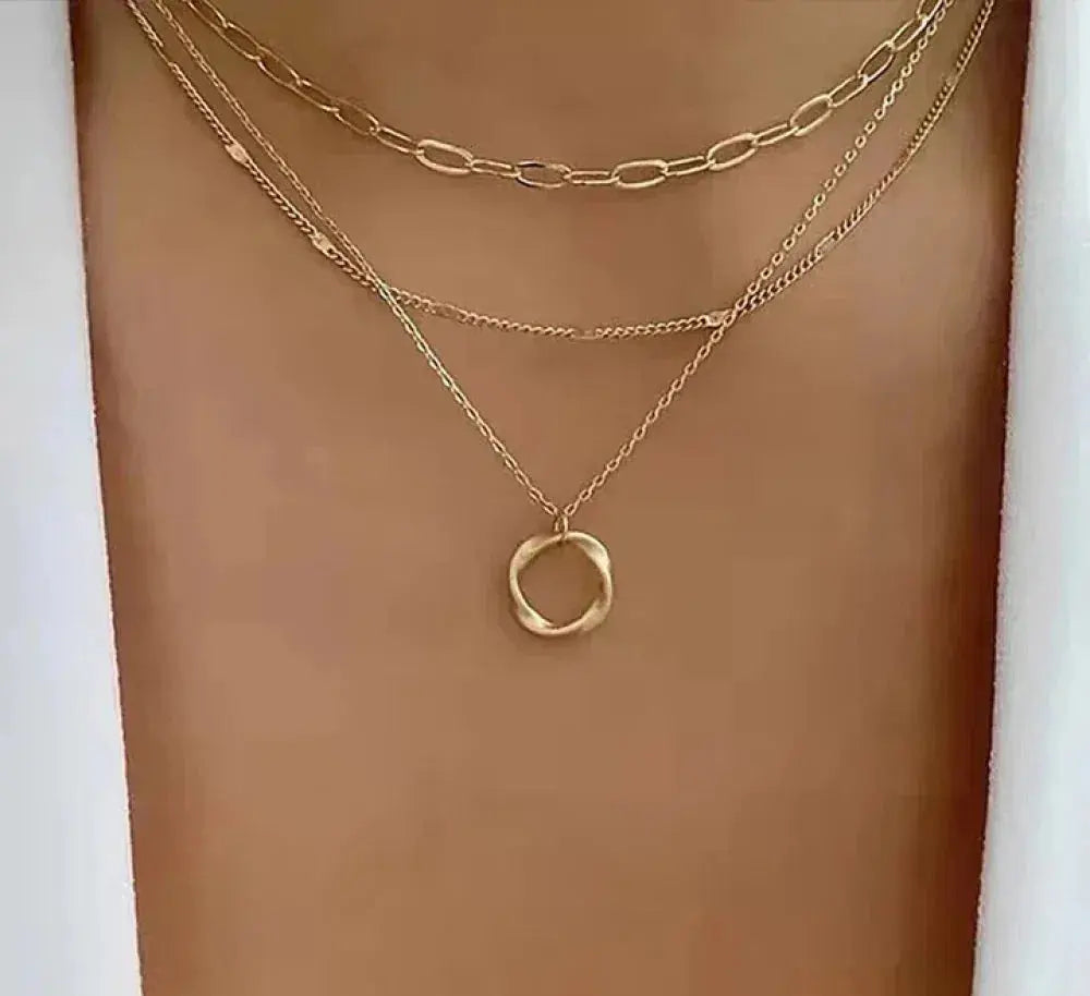 Multi-Layer Statement Necklace with Filigree Ring and Link Chain Pendants