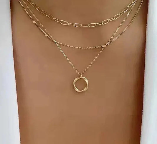 Multi-Layer Statement Necklace with Filigree Ring and Link Chain Pendants